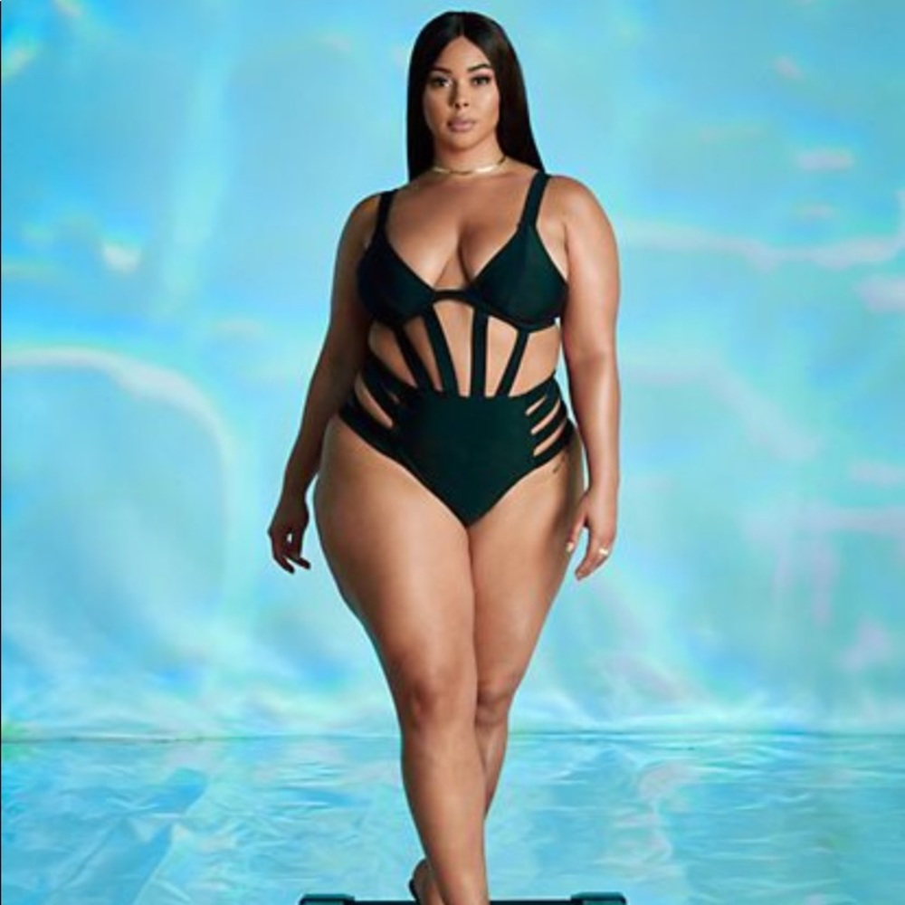 Tabria Majors collab with Fashion to Figure black one piece caged swimsuit